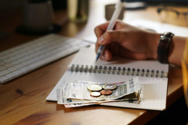 Closeup shot of an entrepreneur working from home on his personal finances and savings